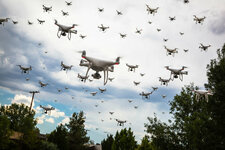 dozens-of-drones-swarm-in-the-cloudy-sky-stockpack-adobe-stock-scaled.jpg