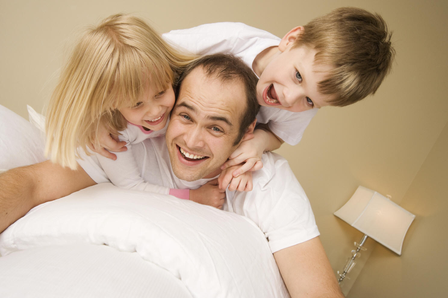 father-with-two-kids-playing.jpg